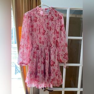 Pink, flowy dress that zips in back. Super comfortable and fun to wear!